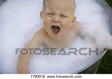 Temper tantrum in the bath View Large Photo Image Stock Photo - Temper tantrum in the bath. Fotosearch