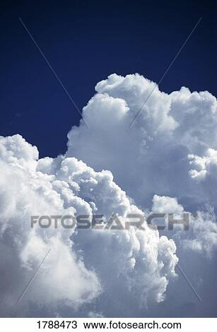 Stock Image - White clouds. Fotosearch