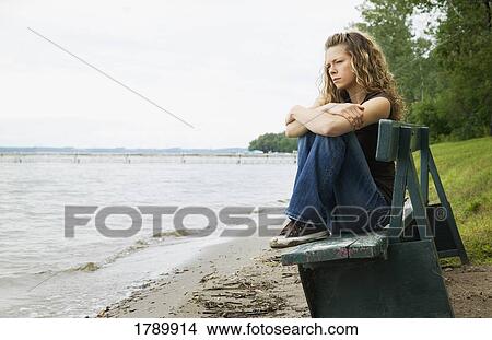 Picture - Woman at a beach. Fotosearch