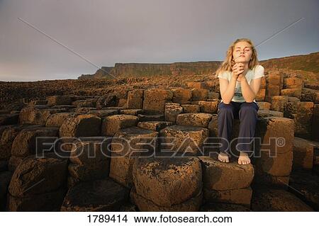 Woman at Giant's Causeway View Large Photo Image Picture - Woman at Giant's Causeway. Fotosearch