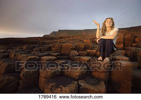 Woman at Giant's Causeway View Large Photo Image Stock Photograph - Woman at Giant's Causeway. Fotosearch