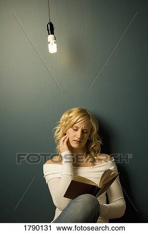 Stock Image - Woman reading. Fotosearch