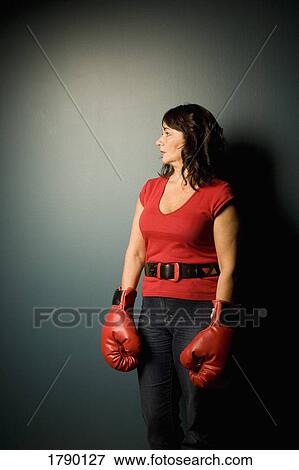 Woman with boxing gloves View Large Photo Image Stock Photo - Woman with boxing gloves. Fotosearch