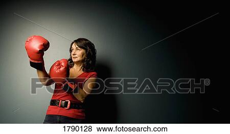 Woman with boxing gloves View Large Photo Image Stock Photo - Woman with boxing gloves. Fotosearch