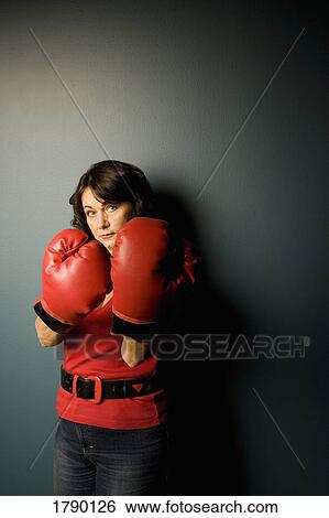 Woman with boxing gloves View Large Photo Image Stock Photograph - Woman with boxing gloves. Fotosearch