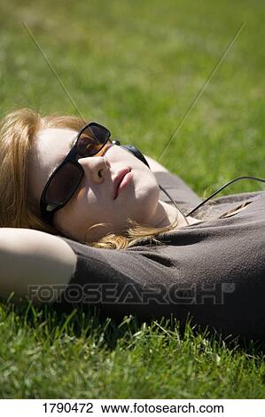 Woman with headphones View Large Photo Image Stock Image - Woman with headphones. Fotosearch