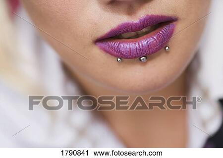 Woman with pierced lip View Large Photo Image Stock Image - Woman with pierced lip. Fotosearch