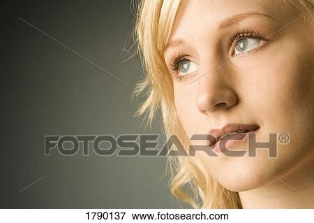 Stock Photo - Woman's head shot. Fotosearch