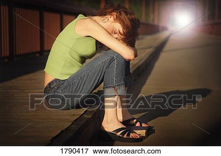 Women resting on the wooden walkway View Large Photo Image Stock Photo - Women resting on the wooden walkway. Fotosearch