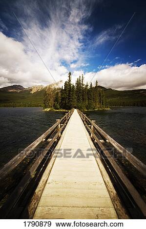 Stock Photo - Wooden bridge to island. Fotosearch