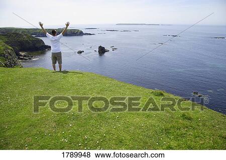 Stock Photo - Worship on the seashore. Fotosearch