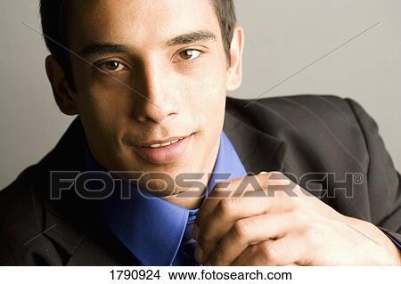 Young adult posing for a portrait View Large Photo Image Picture - Young adult posing for a portrait. Fotosearch