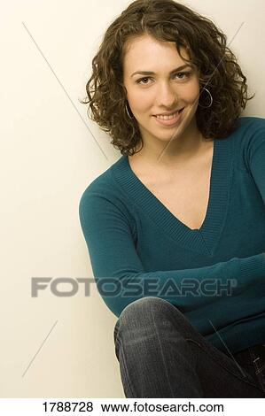 Stock Photo - Young brunette woman. Fotosearch