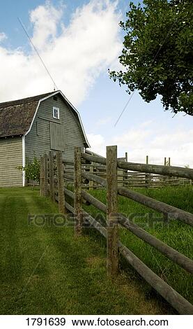 Stock Photo - Barn and fenced in area. Fotosearch