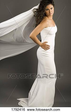 Bride in wedding dress View Large Photo Image Stock Photograph - Bride in wedding dress. Fotosearch