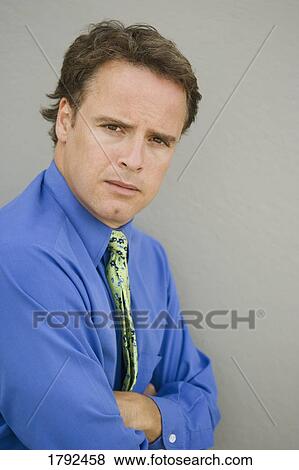 Business man with arms crossed View Large Photo Image Stock Photo - Business man with arms crossed. Fotosearch