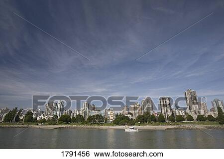 Stock Photograph - Cityscape across a bay. Fotosearch