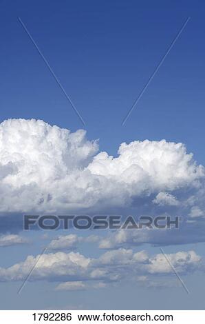 Clouds in the sky View Large Photo Image Stock Photograph - Clouds in the sky. Fotosearch