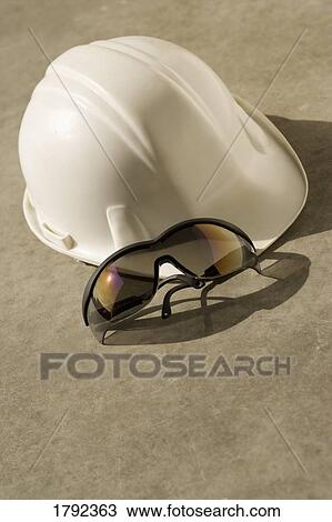 Construction hat and safety glasses View Large Photo Image Stock Image - Construction hat and safety glasses. Fotosearch