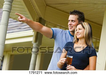 Couple having coffee on porch View Large Photo Image Stock Image - Couple having coffee on porch. Fotosearch