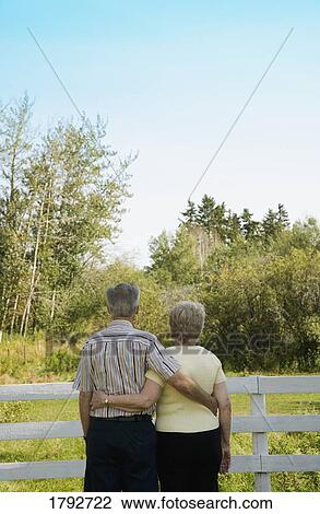 Stock Image - Couple hugging. Fotosearch