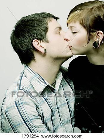 Couple kissing View Large Photo Image Picture - Couple kissing. Fotosearch