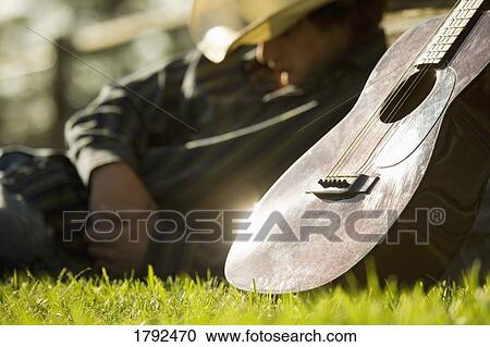 Cowboy with guitar View Large Photo Image Stock Image - Cowboy with guitar. Fotosearch