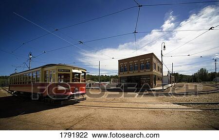 Electric train in town View Large Photo Image Stock Image - Electric train in town. Fotosearch