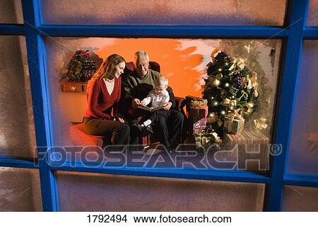 Picture - Family at Christmas. Fotosearch