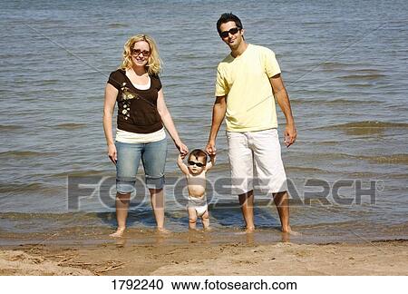 Family at the beach View Large Photo Image Stock Image - Family at the beach. Fotosearch