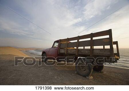 Farm truck on beach View Large Photo Image Stock Photo - Farm truck on beach. Fotosearch