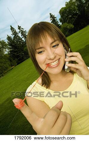 Female playing with bubblegum View Large Photo Image Stock Photograph - Female playing with bubblegum. Fotosearch