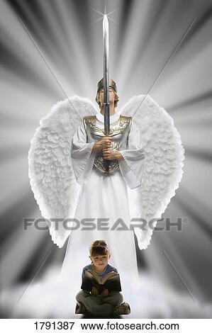 Stock Photo - Girl reading Bible with angel behind her. Fotosearch