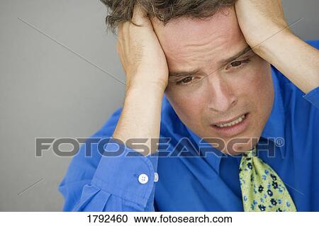 Stock Image - Grief-stricken man. Fotosearch