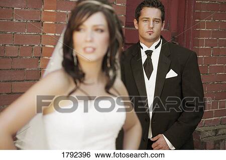 Stock Photograph - Groom and bride. Fotosearch