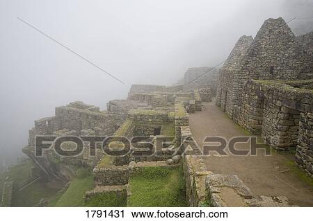 Stock Image - Incan ruins of Machu Picchu in Peru. Fotosearch