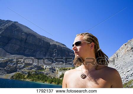 Man in nature View Large Photo Image Stock Photo - Man in nature. Fotosearch