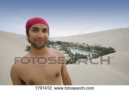 Man near Huacachina in Peru View Large Photo Image Stock Image - Man near Huacachina in Peru. Fotosearch