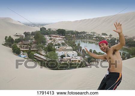 Man near Huacachina in Peru View Large Photo Image Stock Image - Man near Huacachina in Peru. Fotosearch