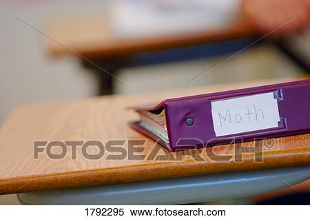 Stock Photography - Math binder on school desk. Fotosearch