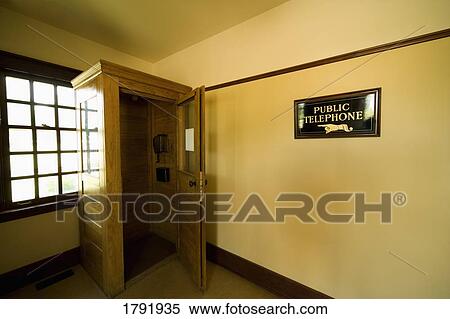 Stock Photography - Old-fashioned public telephone. Fotosearch