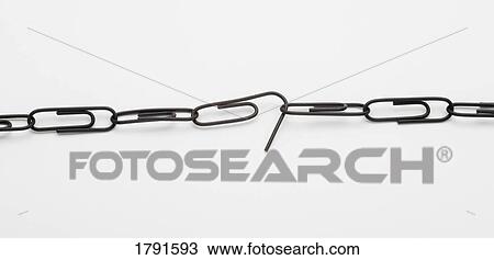 Paper clip chain with weakened link View Large Photo Image Stock Image - Paper clip chain with weakened link. Fotosearch