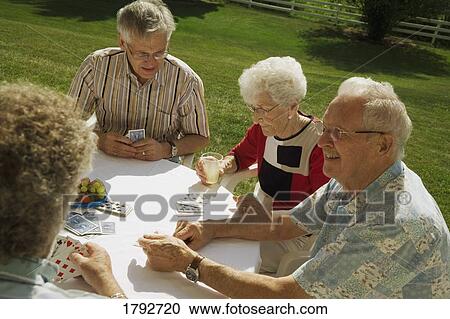 People playing cards View Large Photo Image Stock Image - People playing cards. Fotosearch