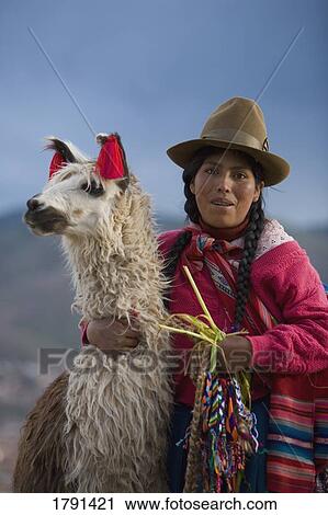 Peruvian woman with an Alpaca View Large Photo Image Stock Image - Peruvian woman with an Alpaca. Fotosearch