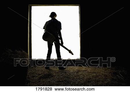Silhouette of guitar player View Large Photo Image Stock Photo - Silhouette of guitar player. Fotosearch