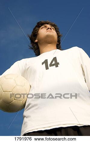 Stock Photograph - Soccer player. Fotosearch