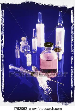 Syringes and vials of medication View Large Photo Image Stock Image - Syringes and vials of medication. Fotosearch