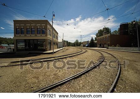 Stock Image - Train tracks through town. Fotosearch