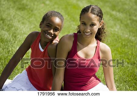 Two girls View Large Photo Image Stock Photograph - Two girls. Fotosearch