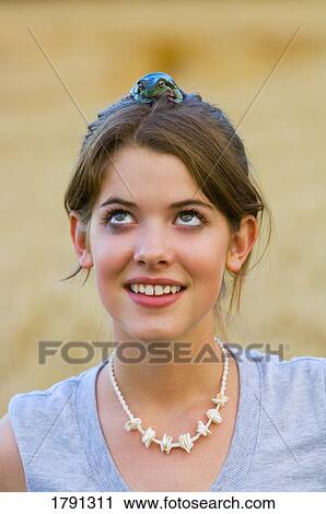 White's Tree Frog on girl's head View Large Photo Image Stock Image - White's Tree Frog on girl's head. Fotosearch